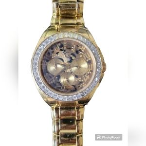 Womens gold Guess watch with cubic studs Leopard print middle